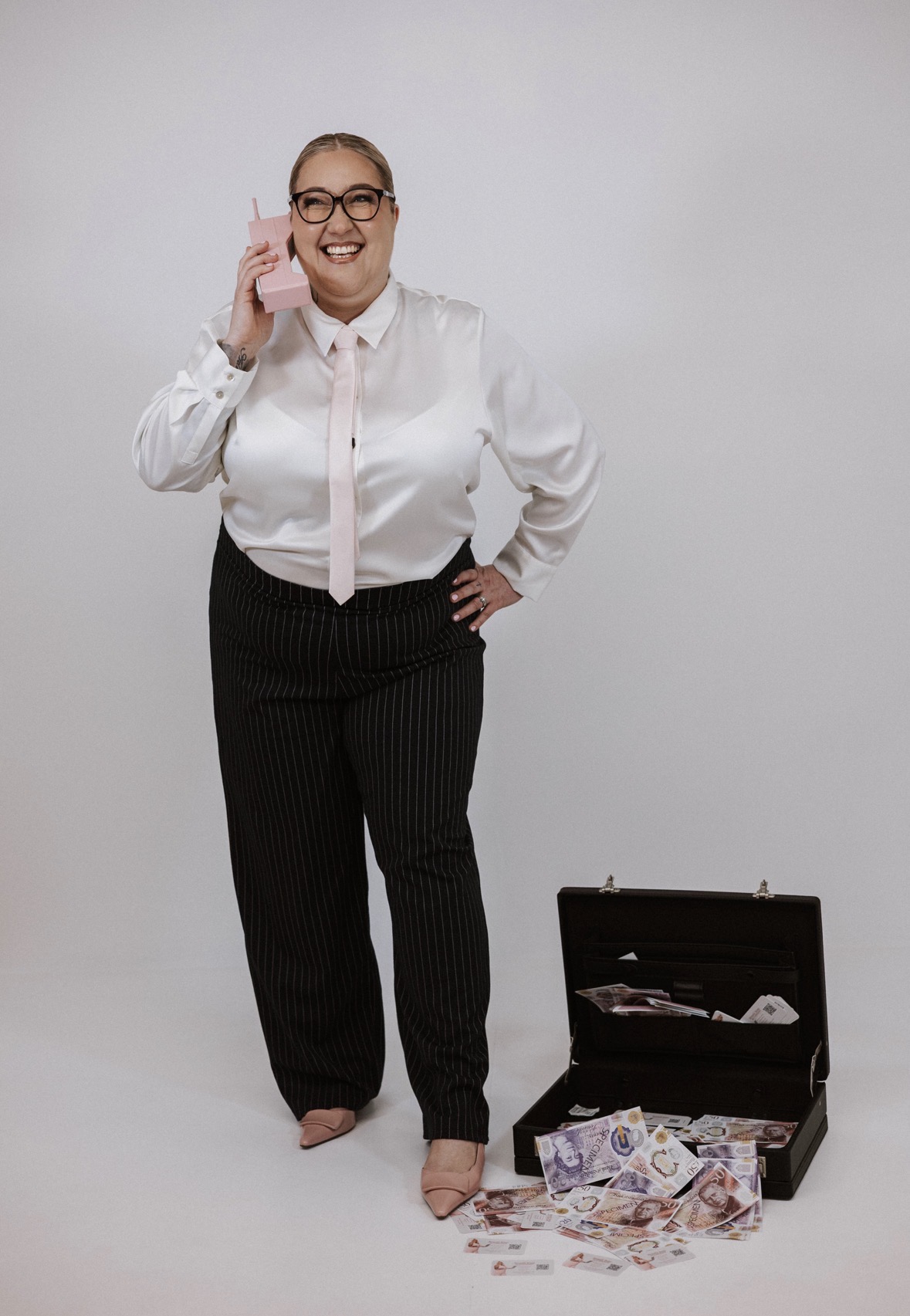 Gemma Dwyer with briefcase of cash